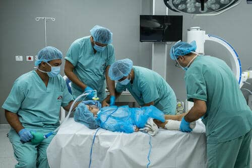 Medical team caring for a patient